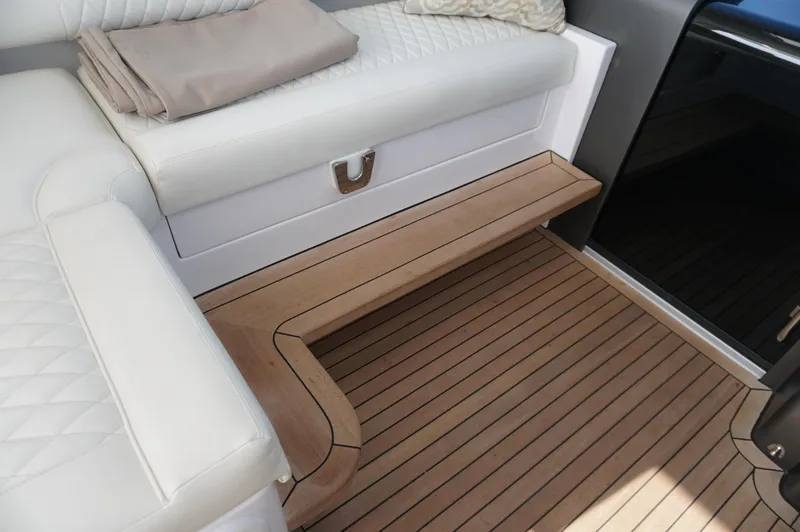 Slide: The Image of Interior of 2021 Jupiter 41 SB yacht with wooden flooring and white upholstery. - 22