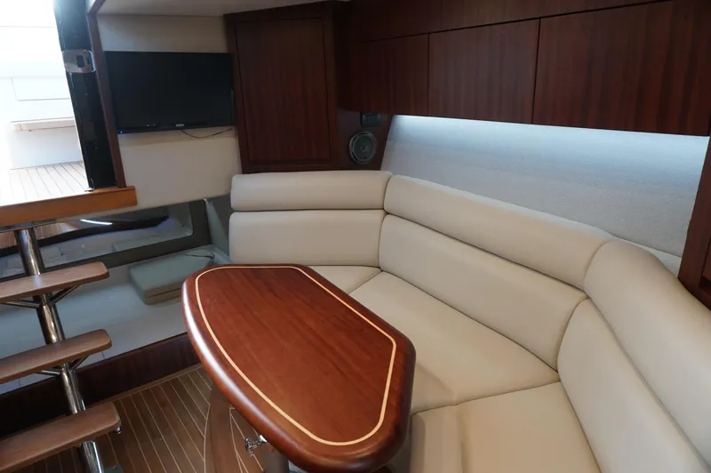 Slide: The Image of Interior of 2021 Jupiter 41 SB yacht with elegant seating and wooden table. - 24