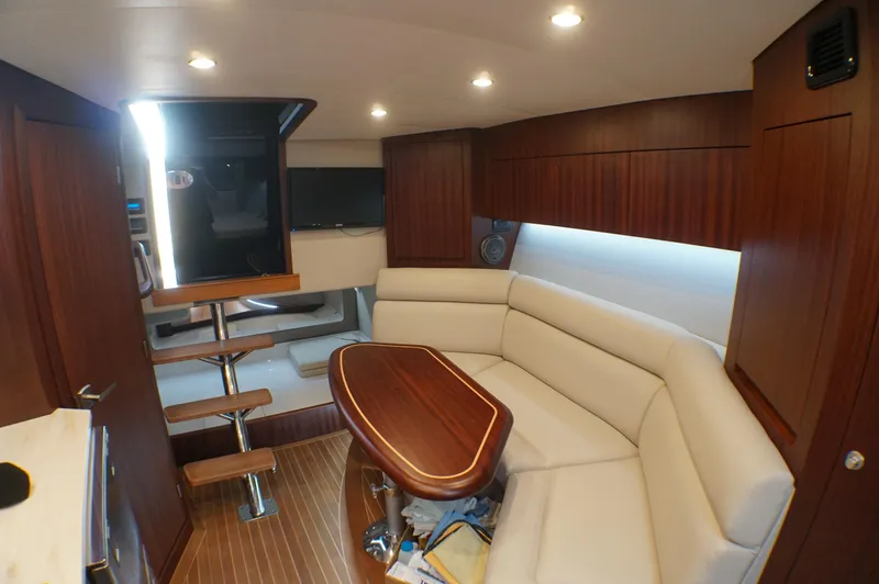 Slide: The Image of Interior of a 2021 Jupiter 41 SB yacht with elegant wood finish. - 25