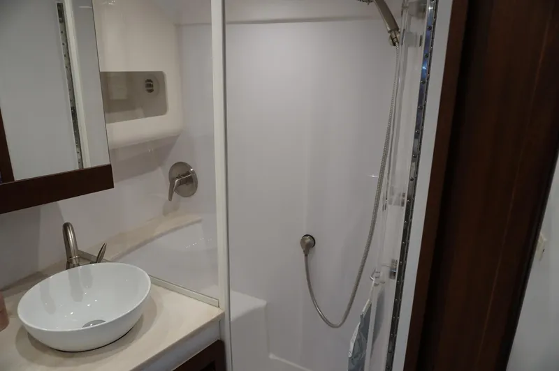 Slide: The Image of Modern bathroom in Jupiter 41 SB boat, year 2021. - 32