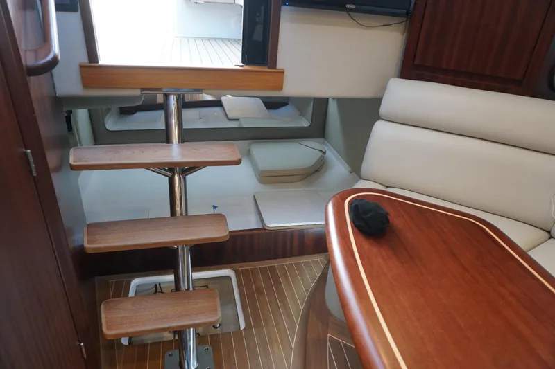 Slide: The Image of Interior of 2021 Jupiter 41 SB yacht with wooden stairs and seating area. - 46