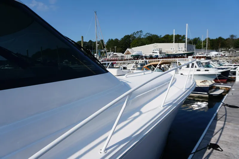 Slide: The Image of Jupiter 41 SB 2021 yacht docked at marina, sunny day. - 5