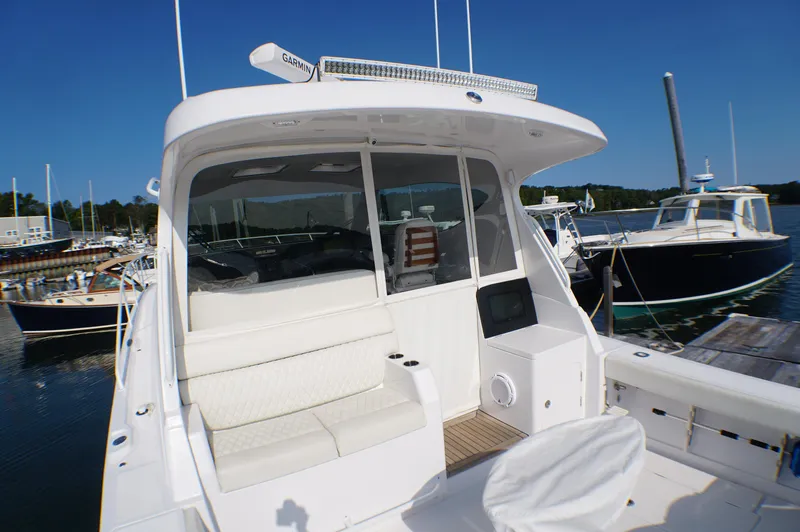 Slide: The Image of Jupiter 41 SB 2021 boat docked with white interior. - 7