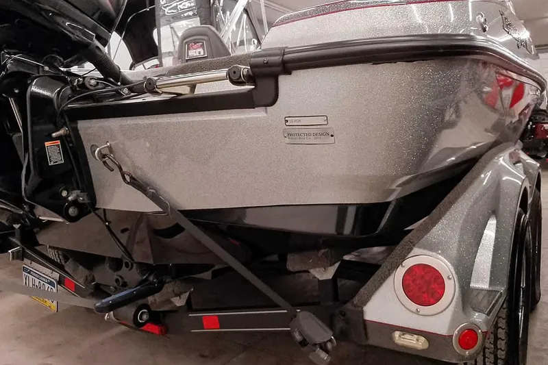 Slide: The Image of 2018 Ranger 1880MS Angler boat rear view with trailer in a garage. - 16