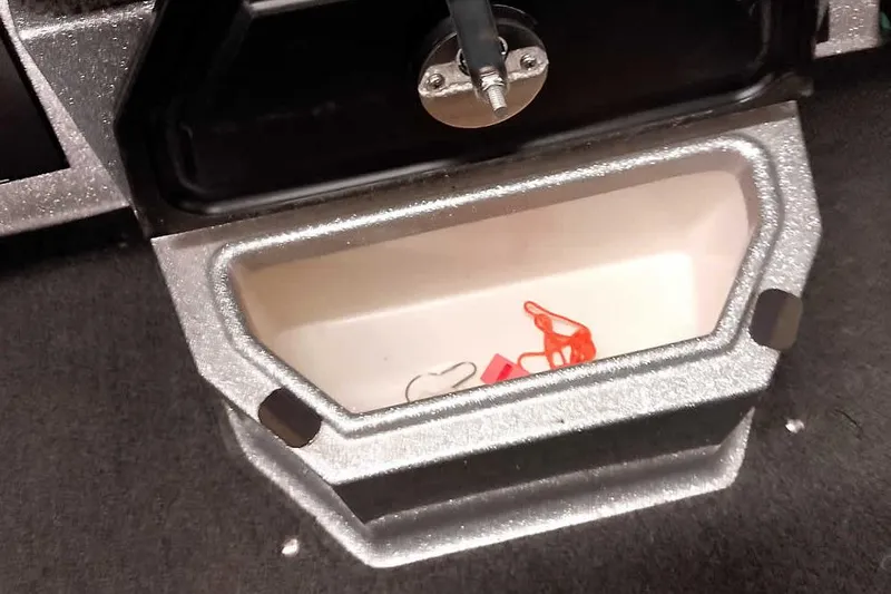 Slide: The Image of Open storage compartment in 2018 Ranger 1880MS Angler boat, showing interior details. - 19