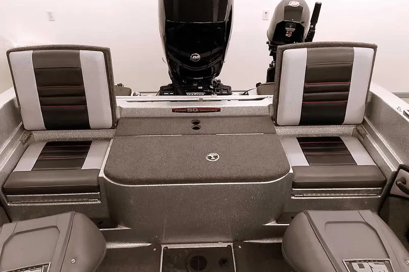Slide: The Image of 2018 Ranger 1880MS Angler boat interior with dual seats and motor. - 35