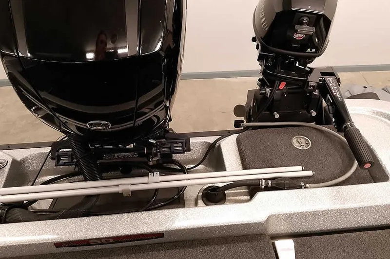 Slide: The Image of 2018 Ranger 1880MS Angler boat with dual motors and fishing equipment. - 37