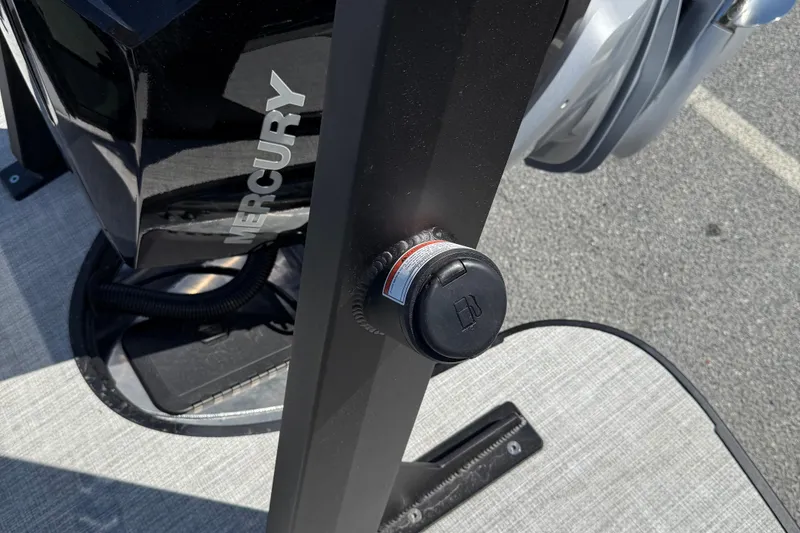 Slide: The Image of Close-up of a Mercury engine component on an Alera M23Q, 2026 model. - 19