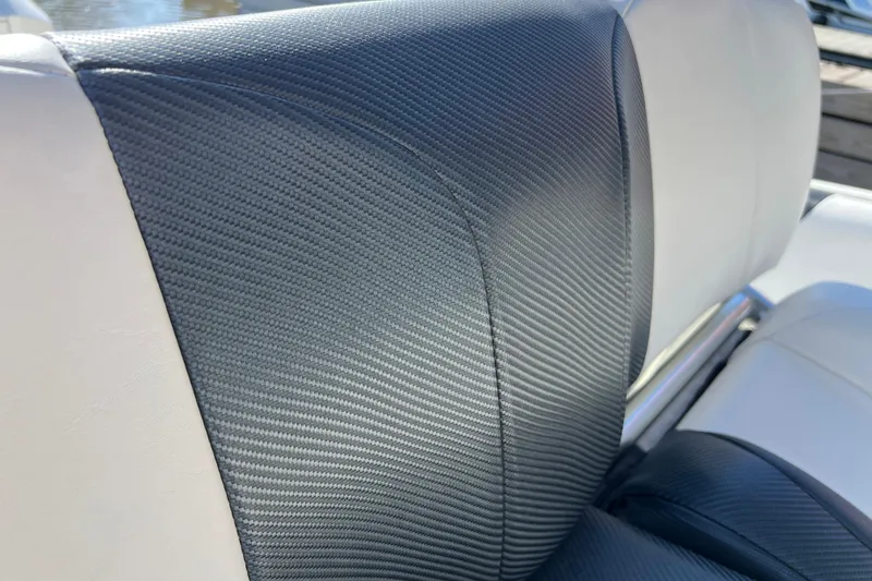 Slide: The Image of Close-up of 2001 Hydra-Sports Vector 2600 CC boat seat with textured upholstery. - 10