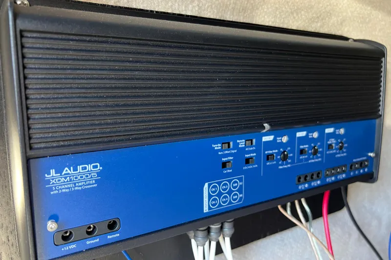 Slide: The Image of JL Audio XDM1000/5 amplifier installed on a 2001 Hydra-Sports Vector 2600 CC boat. - 13