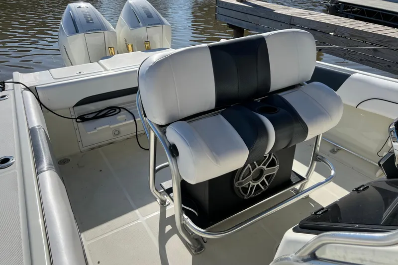 Slide: The Image of 2001 Hydra-Sports Vector 2600 CC boat interior with dual engines and cushioned seating. - 9