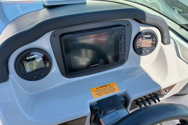 Slide: The Image of Dashboard of 2019 Chaparral 21 H2O Sport boat with Garmin display and Yamaha gauges. - 8