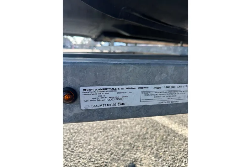 Slide: The Image of Label on Load Rite trailer, showing specifications and manufacturing details. - 17