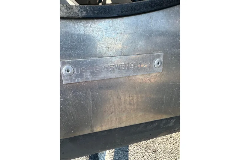 Slide: The Image of Metallic identification plate on 2022 Sweetwater 2386 SB boat hull. - 18