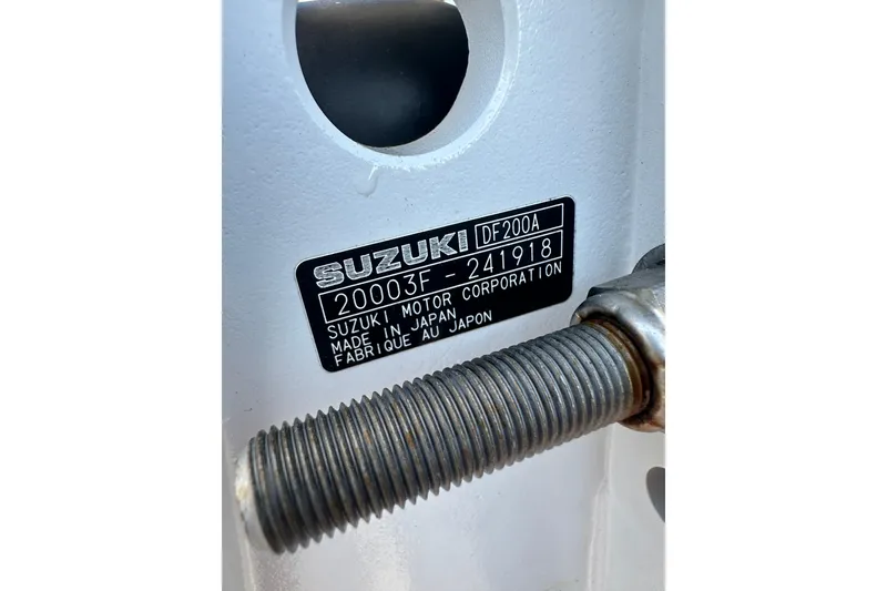 Slide: The Image of Label on Suzuki DF200A motor, showing serial number and manufacturing details. - 19