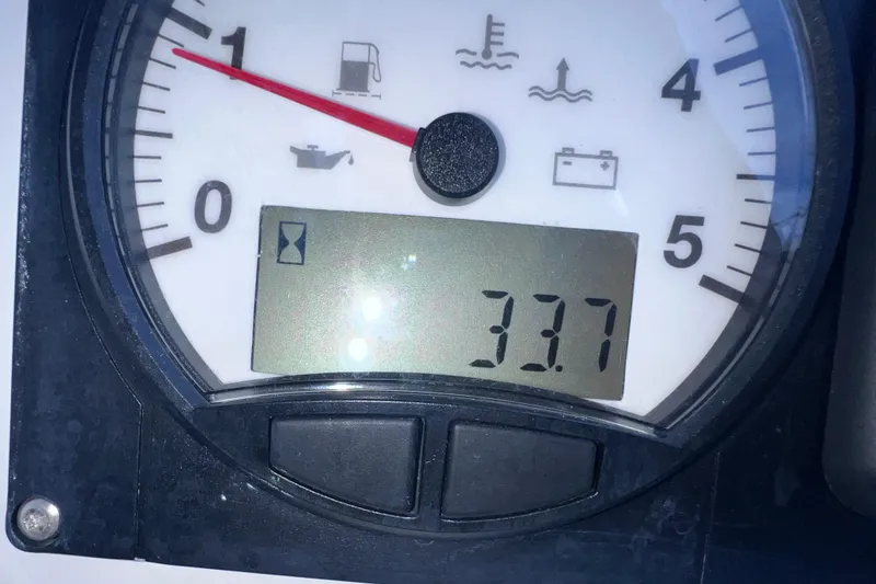 Slide: The Image of Close-up of Beneteau Oceanis 30.1 2024 engine gauge displaying 3.7 hours. - 14