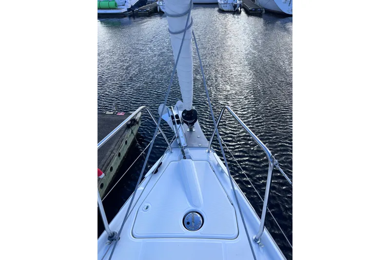 Slide: The Image of Bow view of 2024 Beneteau Oceanis 30.1 sailboat docked in marina. - 5