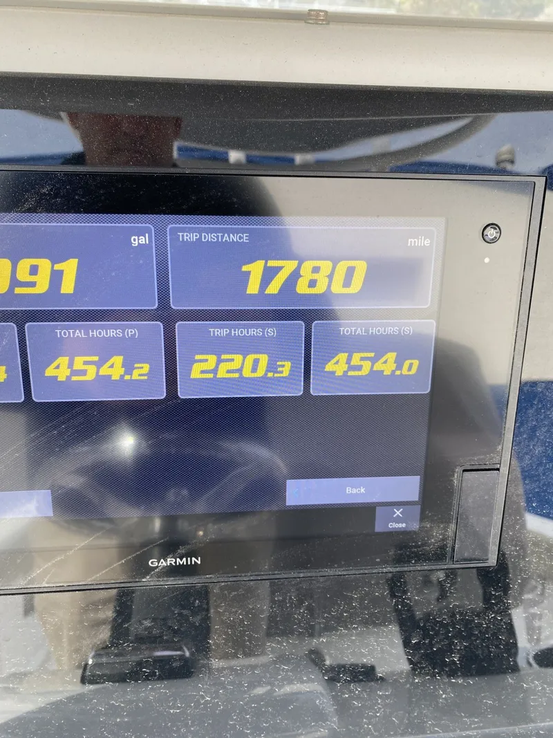 Slide: The Image of Garmin display on Sportsman Open 282 boat, showing 1780 miles trip distance. - 4