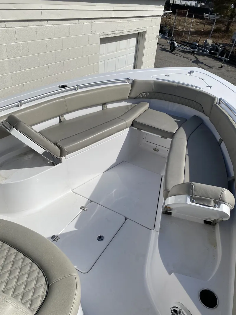 Slide: The Image of 2021 Sportsman Open 282 Center Console boat with gray seating. - 8