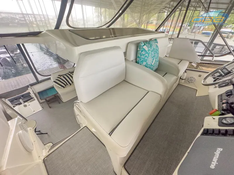 Slide: The Image of Interior of a 1996 Silverton 442 Cockpit Motor Yacht. - 18
