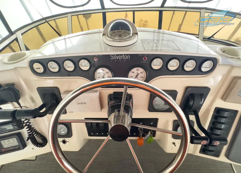 Slide: The Image of Dashboard of the 1996 Silverton 442 Cockpit Motor Yacht. - 23