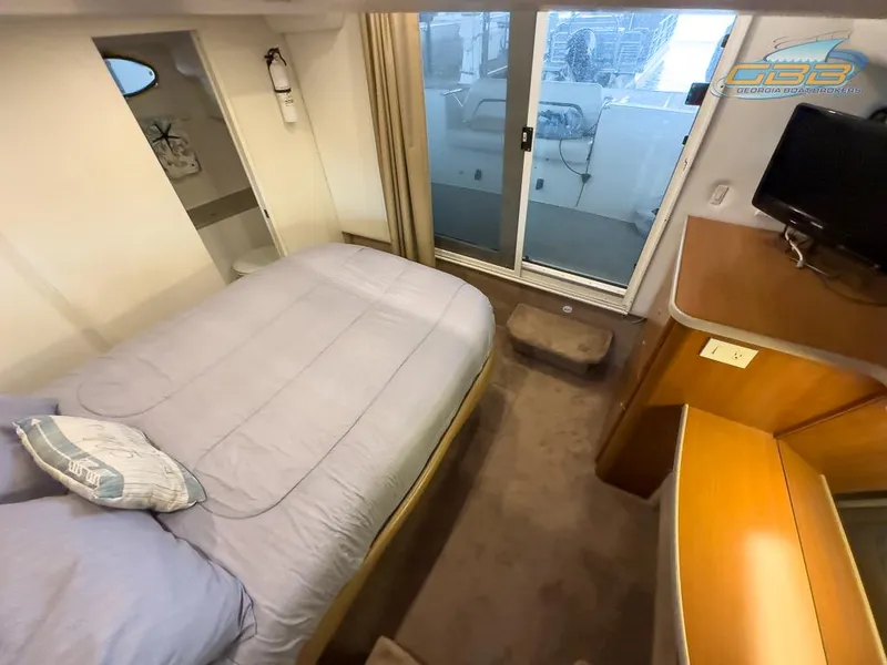 Slide: The Image of Interior of 1996 Silverton 442 Cockpit Motor Yacht, bedroom view. - 31