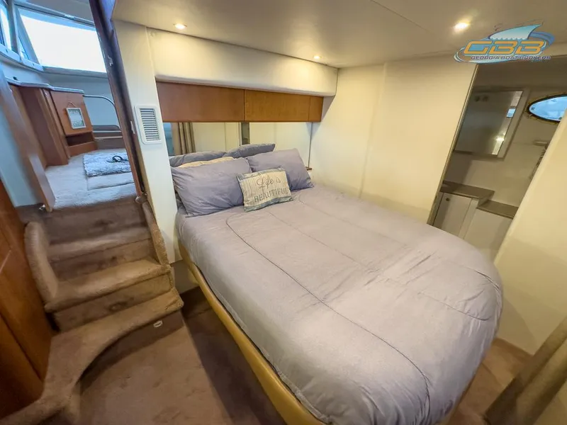 Slide: The Image of Interior of 1996 Silverton 442 Cockpit Motor Yacht, bedroom view. - 32