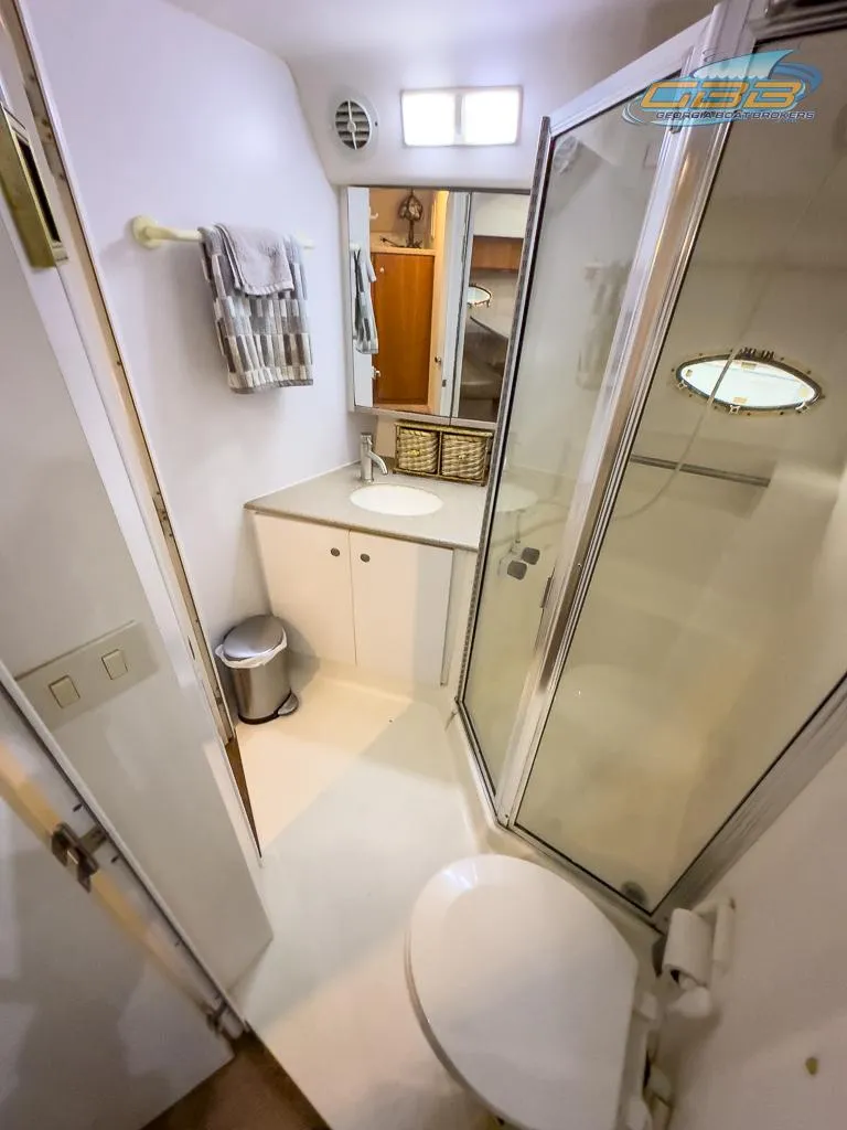 Slide: The Image of Bathroom of the 1996 Silverton 442 Cockpit Motor Yacht. - 35