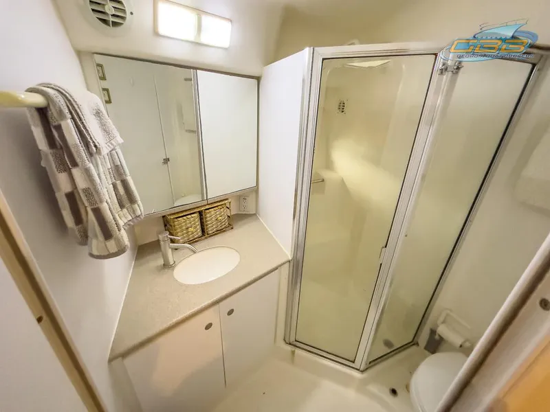 Slide: The Image of Bathroom of the 1996 Silverton 442 Cockpit Motor Yacht. - 37