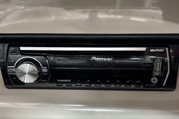 Slide: The Image of Pioneer stereo system in a 2002 Sea Ray 182 Bow Rider boat dashboard. - 13