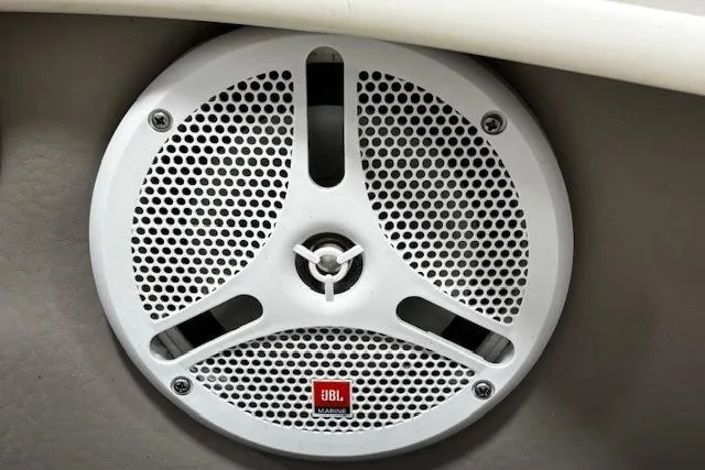 Slide: The Image of JBL marine speaker on 2002 Sea Ray 182 Bow Rider boat interior. - 15
