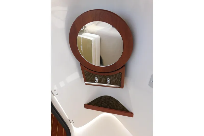 Slide: The Image of Round mirror with wooden frame on Grady-White Freedom 307 boat, 2015 model. - 33