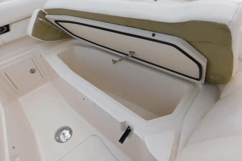 Slide: The Image of 2015 Grady-White Freedom 307 boat storage compartment with open hatch. - 36