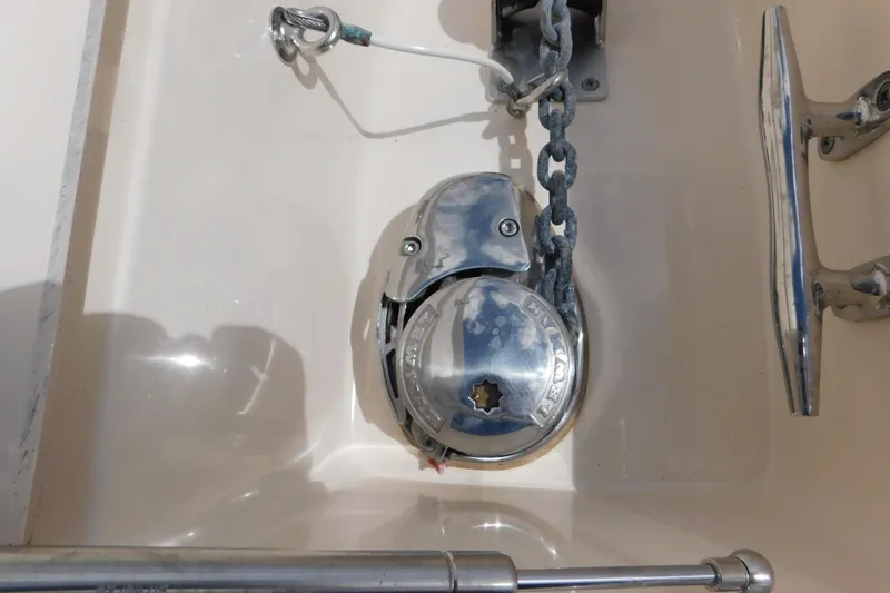 Slide: The Image of Anchor windlass on 2015 Grady-White Freedom 307 boat deck. - 43