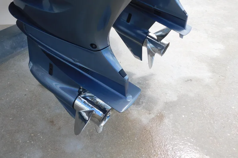 Slide: The Image of Close-up of dual outboard motors on a 2015 Grady-White Freedom 307 boat. - 9