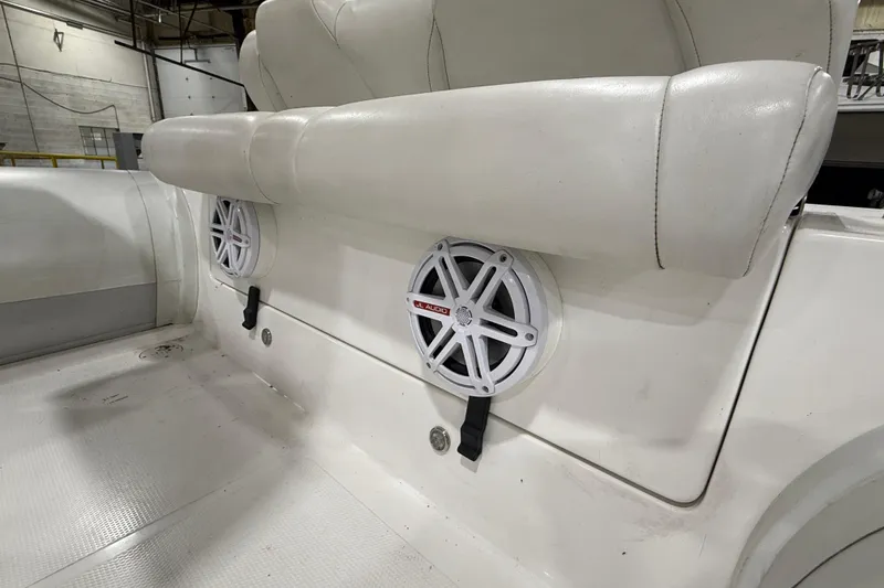 Slide: The Image of White Mercury 560 boat interior with JL Audio speakers, 2013 model. - 6