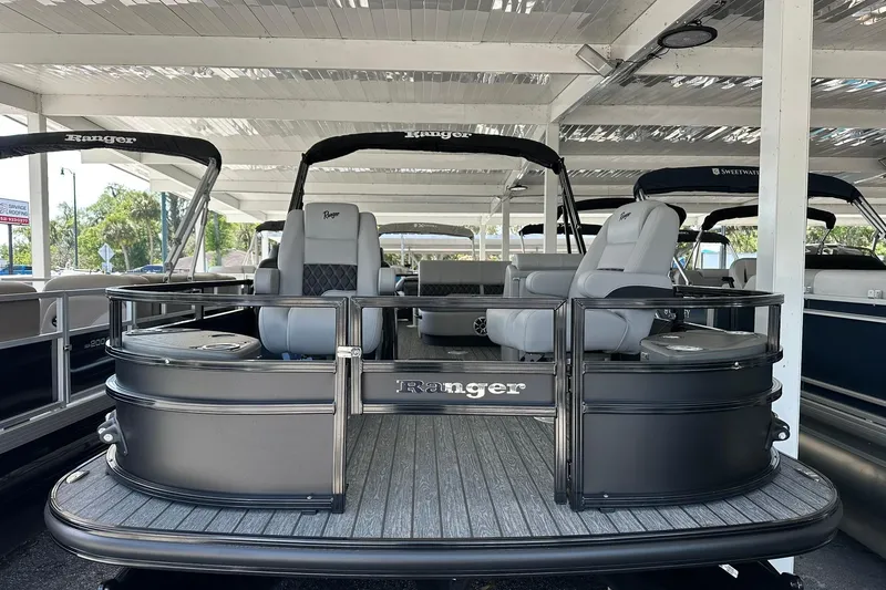 The Image of 2026 Ranger Reata 223FC pontoon boat with sleek design and comfortable seating. - 0