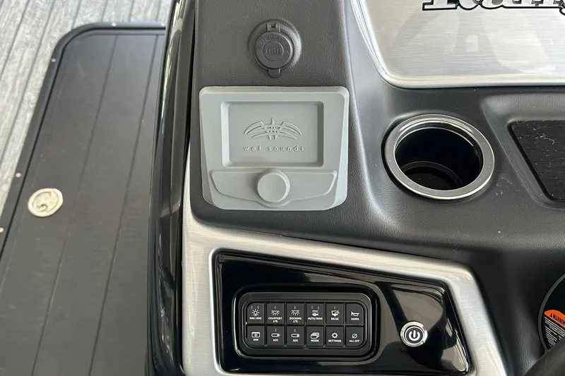 Slide: The Image of Control panel of 2026 Ranger Reata 223FC boat with Wet Sounds audio system. - 19