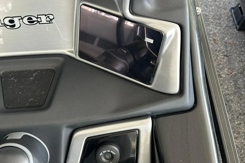 Slide: The Image of Dashboard of 2026 Ranger Reata 223FC boat with control panel and display screen. - 20