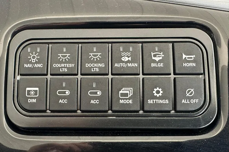 Slide: The Image of Control panel of 2026 Ranger Reata 223FC boat with various function buttons. - 21