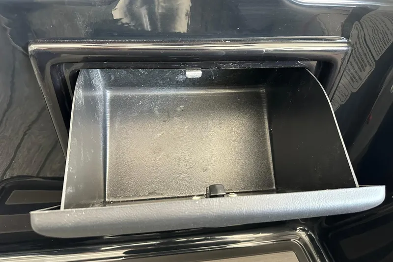 Slide: The Image of Open storage compartment in 2026 Ranger Reata 223FC boat. - 23