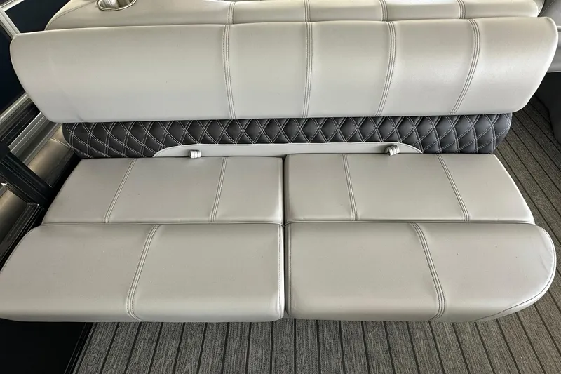 Slide: The Image of 2026 Ranger Reata 223FC boat seat with gray upholstery and diamond stitching. - 29