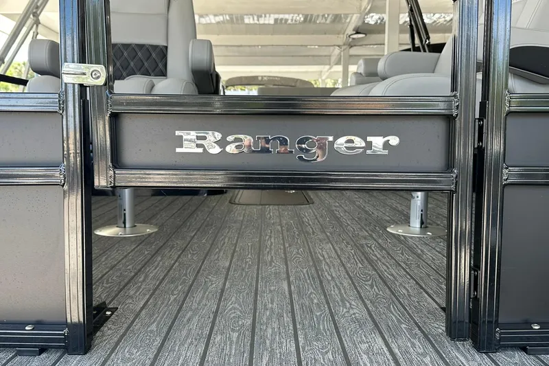 Slide: The Image of 2026 Ranger Reata 223FC boat interior with sleek seating and stylish flooring. - 4
