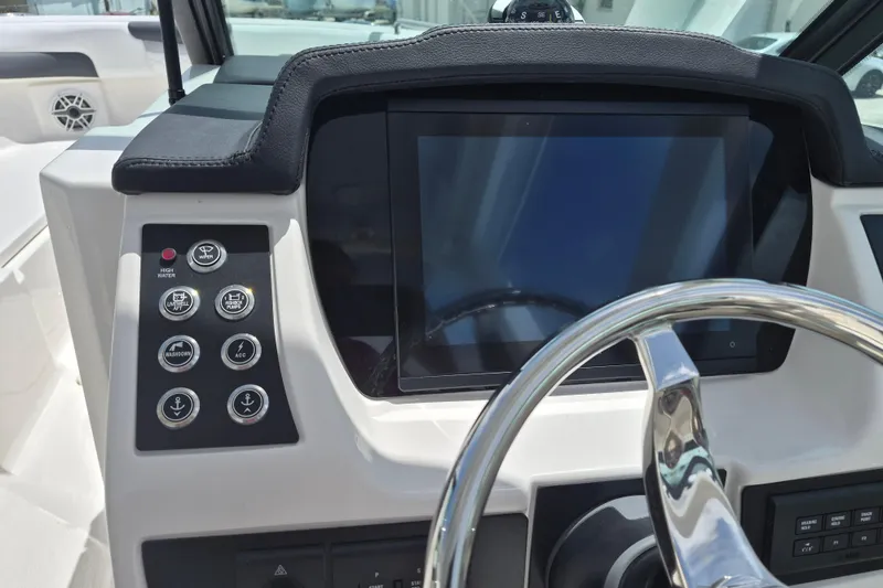 Slide: The Image of 2026 Robalo R277 Dual Console dashboard with touchscreen and control buttons. - 6