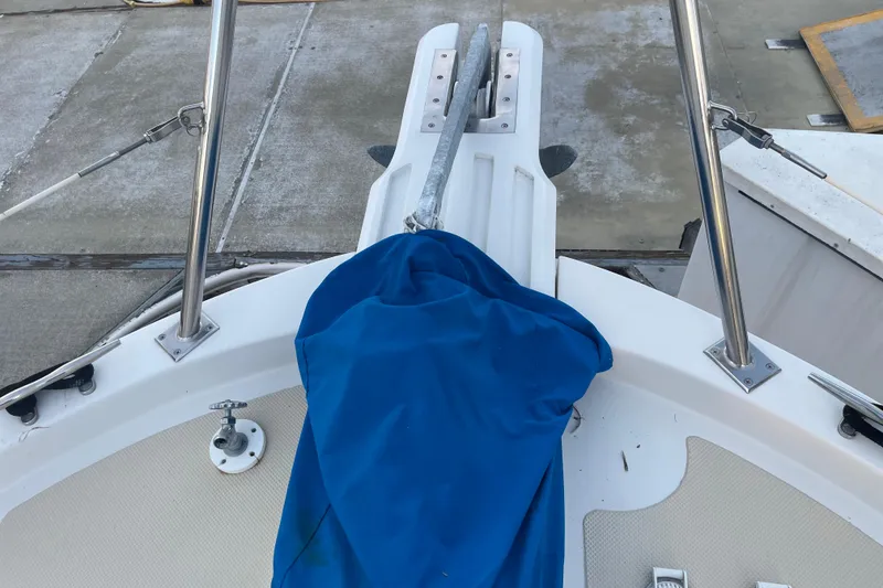 Slide: The Image of 1986 Tung Hwa aft cabin boat deck with anchor and blue cover. - 11