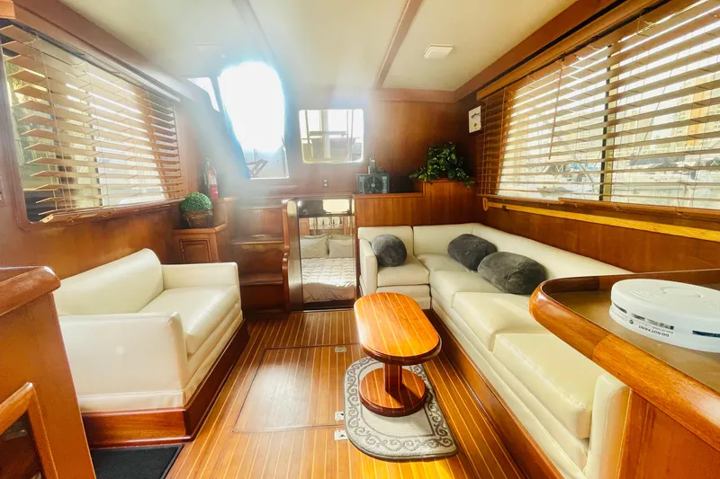 Slide: The Image of Luxurious 1986 Tung Hwa aft cabin interior with elegant wood finishes and plush seating. - 17