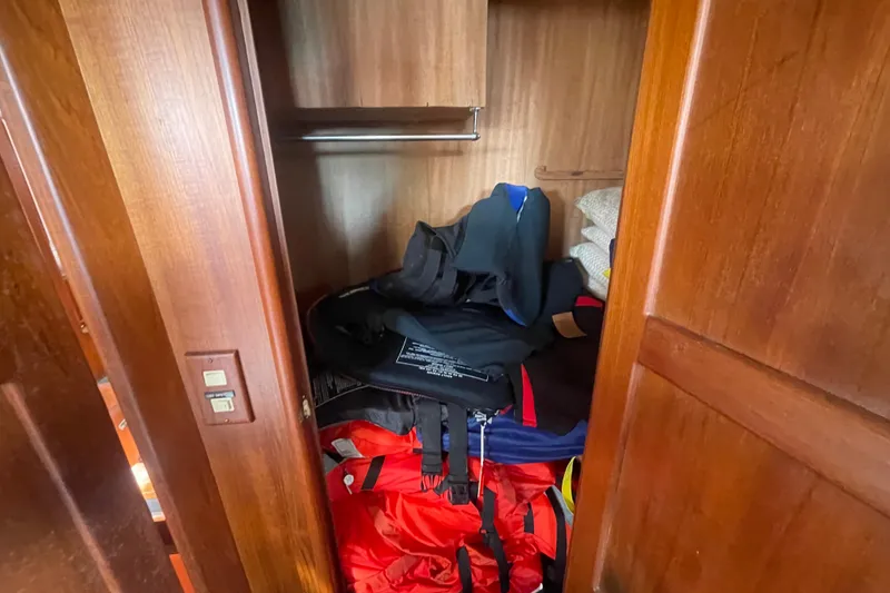 Slide: The Image of Wooden closet in 1986 Tung Hwa aft cabin, storing life jackets and gear. - 40