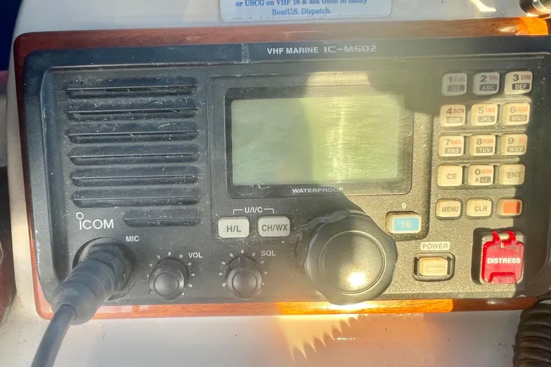 Slide: The Image of VHF marine radio IC-M602 on 1986 Tung Hwa aft cabin boat dashboard. - 48