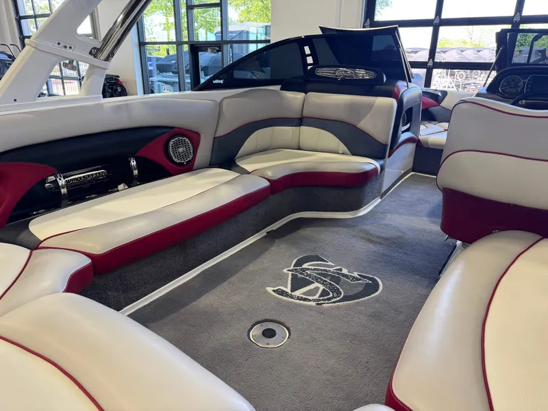 Slide: The Image of Interior of 2012 Malibu Wakesetter 23 LSV with luxurious seating. - 14