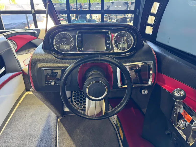Slide: The Image of Interior view of 2012 Malibu Wakesetter 23 LSV cockpit. - 26